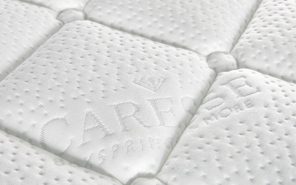 Caresse splittopper 730 detailfoto van de tijk detail tijk Caresse topper 730